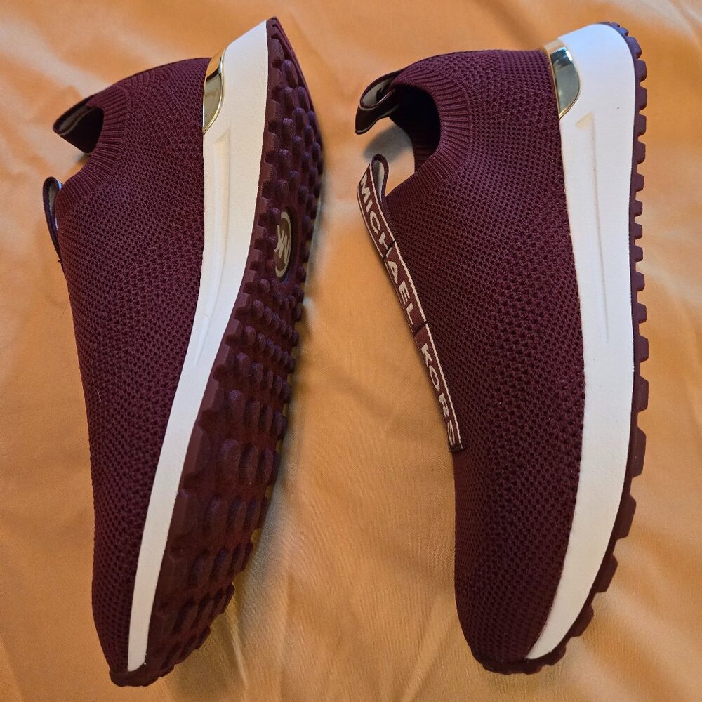 Brand new, never worn Michael Kors slip on Tennis Shoes size 7